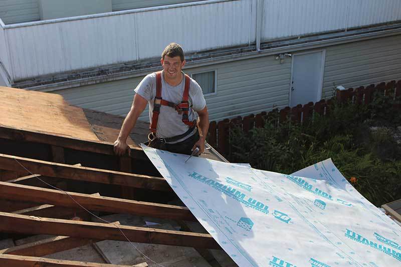 Vancouver roofer working on home roof