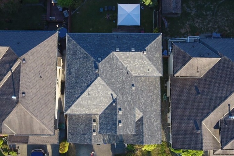 aerial view roof repair project shingles