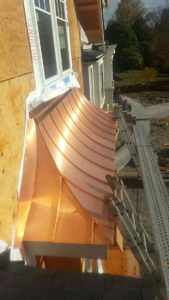 Copper cladding above windows