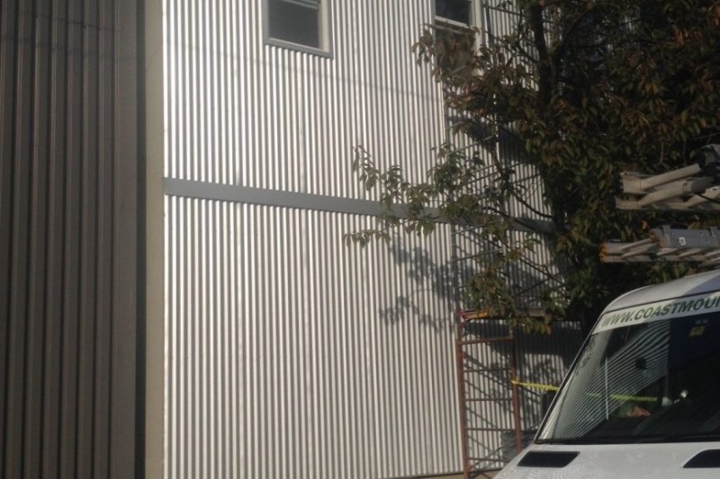 Corrugated metal clad wall industrial