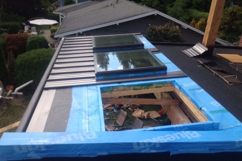 install metal roof with skylight