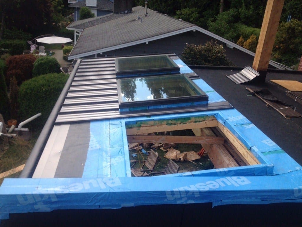 install metal roof with skylight