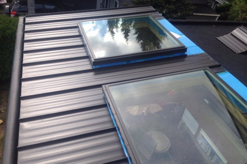 flat metal roofing with skylight
