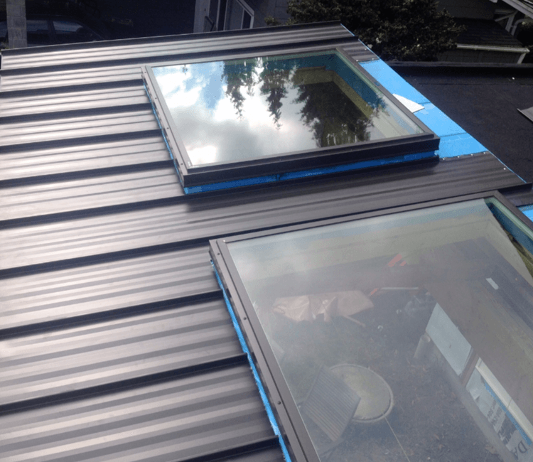 Metal roof with skylight