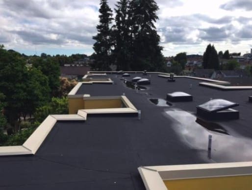 removed ply SBS roof and installed architectural sheet metal work in Vancouver